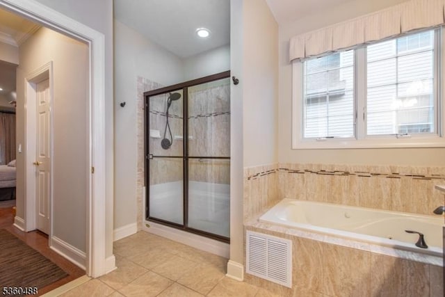 53 Patriots Way, Franklin Twp, NJ 08873 - ensuite bathroom featuring a garden tub, tile patterned floors, a shower stall, baseboards, and recessed lighting
