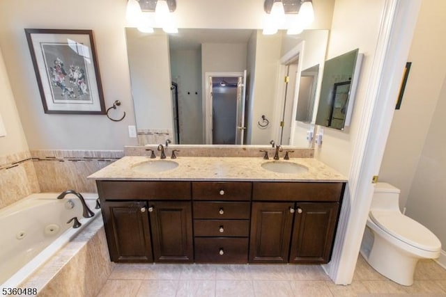 53 Patriots Way, Franklin Twp, NJ 08873 - full bath with a tub with jets, double vanity, tile patterned floors, and toilet
