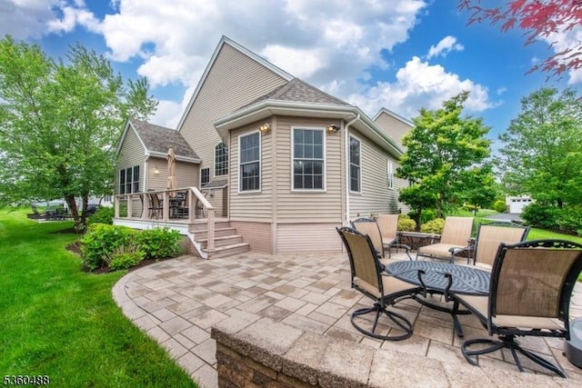 53 Patriots Way, Franklin Twp, NJ 08873 - rear view of property featuring a patio, a yard, and a deck