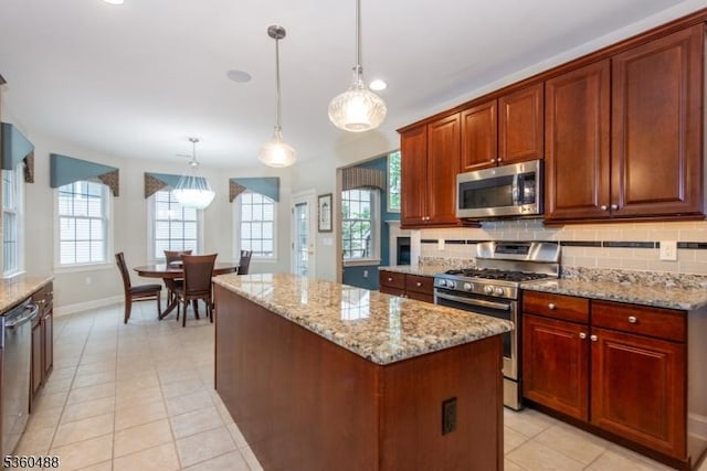 53 Patriots Way, Franklin Twp, NJ 08873 - kitchen featuring stainless steel appliances, tasteful backsplash, healthy amount of natural light, baseboards, and recessed lighting