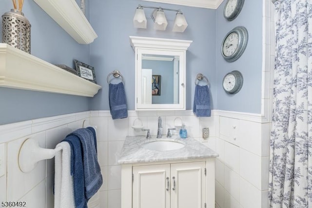 107 Shady Ln, Randolph Twp, NJ 07869 - full bath featuring vanity, a wainscoted wall, tile walls, and a shower with curtain