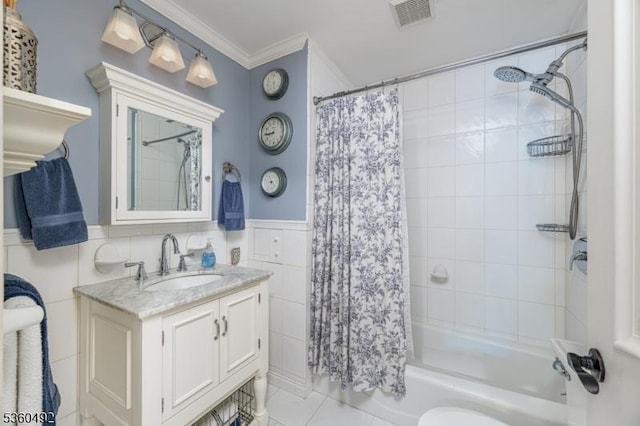 107 Shady Ln, Randolph Twp, NJ 07869 - full bathroom with vanity, crown molding, shower / bath combo with shower curtain, wainscoting, and tile patterned floors