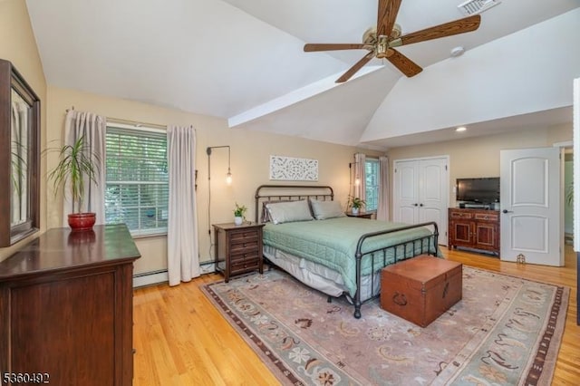 107 Shady Ln, Randolph Twp, NJ 07869 - bedroom with lofted ceiling, light wood-style floors, a baseboard radiator, a ceiling fan, and a closet