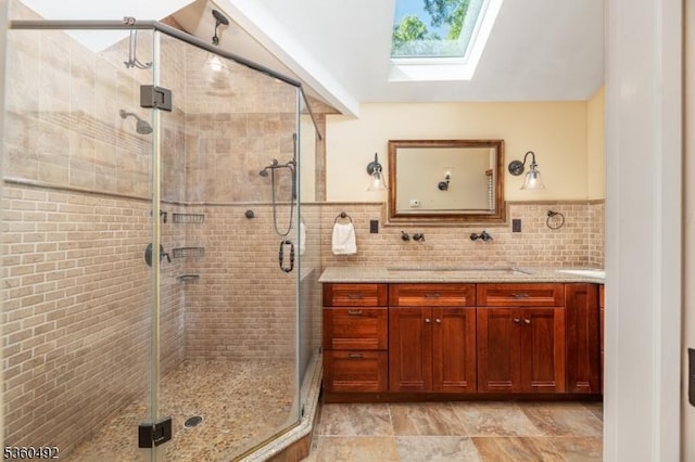 107 Shady Ln, Randolph Twp, NJ 07869 - full bathroom featuring vanity, a skylight, and a stall shower