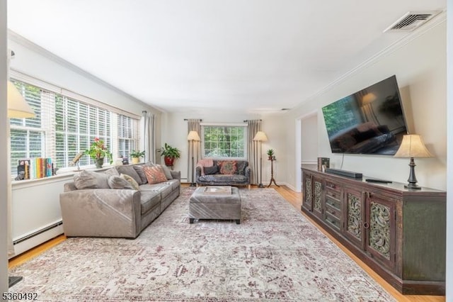 107 Shady Ln, Randolph Twp, NJ 07869 - living room with a baseboard radiator, wood finished floors, and crown molding
