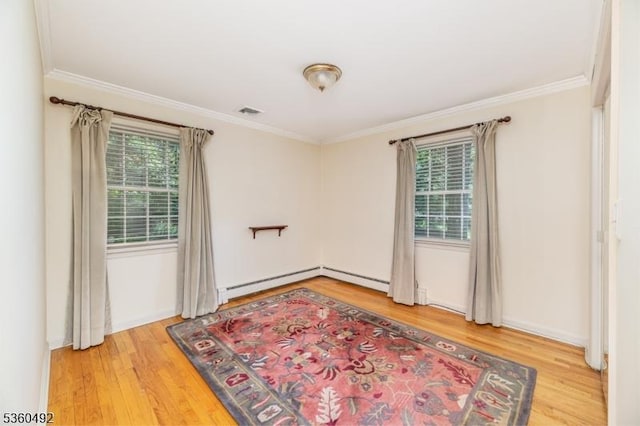 107 Shady Ln, Randolph Twp, NJ 07869 - unfurnished room featuring crown molding, light wood-style flooring, and a baseboard heating unit