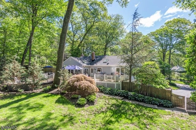 107 Shady Ln, Randolph Twp, NJ 07869 - rear view of property with a wooden deck and a chimney