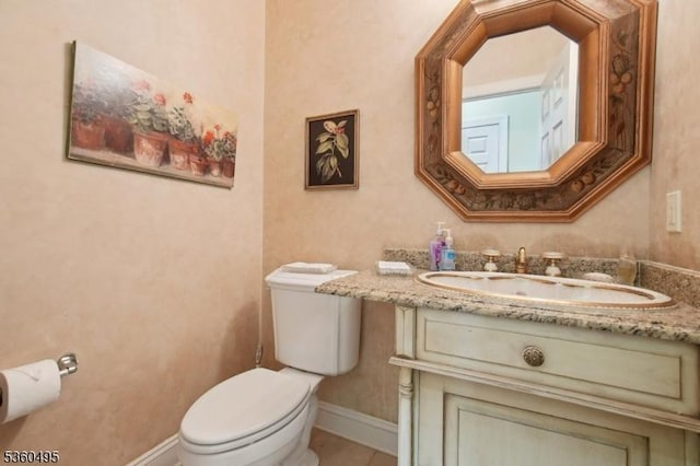 81 Schindler Way, Fairfield Twp, NJ 07004 - half bathroom featuring vanity, toilet, baseboards, and tile patterned flooring