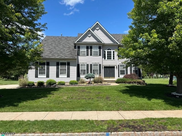 30 Julie Ct, Franklin Twp, NJ 08873 - colonial house with a front lawn and a shingled roof
