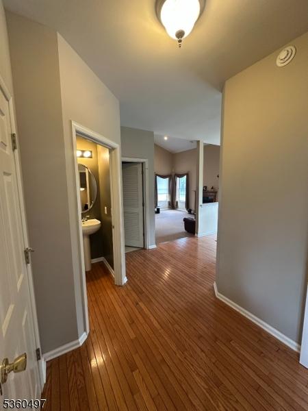 30 Julie Ct, Franklin Twp, NJ 08873 - corridor with wood finished floors and baseboards