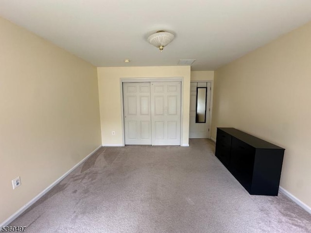 30 Julie Ct, Franklin Twp, NJ 08873 - unfurnished bedroom with carpet floors, baseboards, and a closet