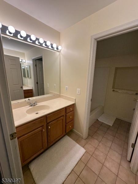30 Julie Ct, Franklin Twp, NJ 08873 - full bath featuring tile patterned flooring and vanity
