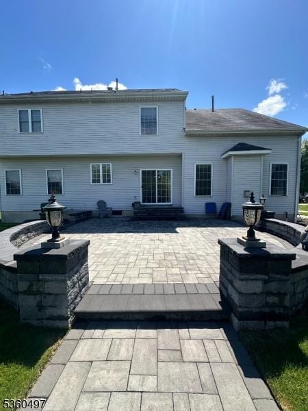 30 Julie Ct, Franklin Twp, NJ 08873 - back of property with a patio