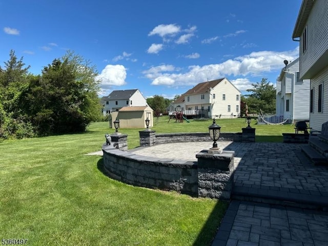 30 Julie Ct, Franklin Twp, NJ 08873 - view of green lawn with a patio area