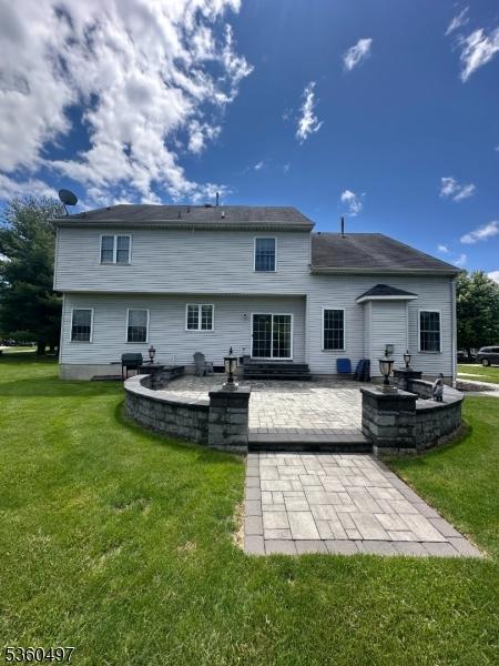 30 Julie Ct, Franklin Twp, NJ 08873 - back of house with a patio area and a yard