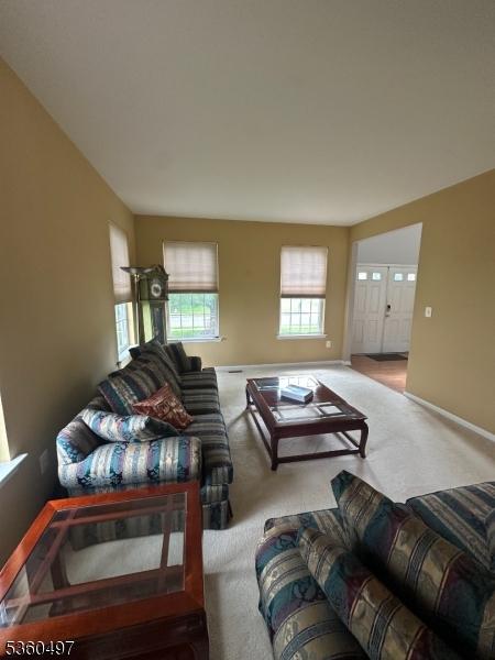 30 Julie Ct, Franklin Twp, NJ 08873 - carpeted living room featuring baseboards