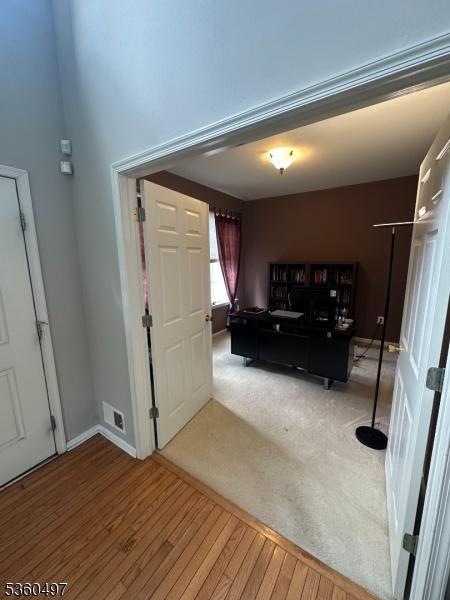 30 Julie Ct, Franklin Twp, NJ 08873 - entrance foyer with wood finished floors and baseboards