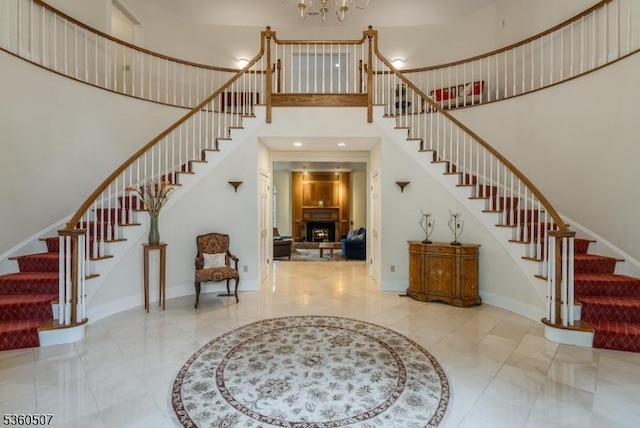 10 Beacon Hill Dr, Chester Twp, NJ 07930 - foyer featuring stairs, a towering ceiling, baseboards, a chandelier, and recessed lighting