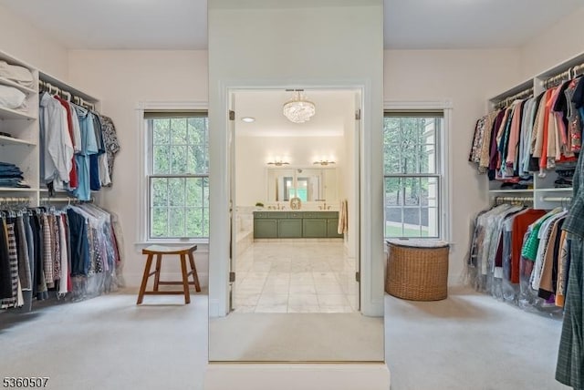 10 Beacon Hill Dr, Chester Twp, NJ 07930 - spacious closet with a chandelier and carpet