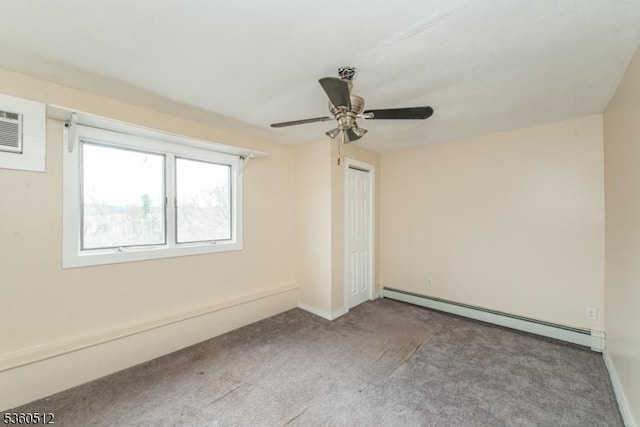 98 Asbury Rd, Independence Twp, NJ 07840 - spare room featuring a baseboard radiator, carpet flooring, a ceiling fan, baseboards, and an AC wall unit