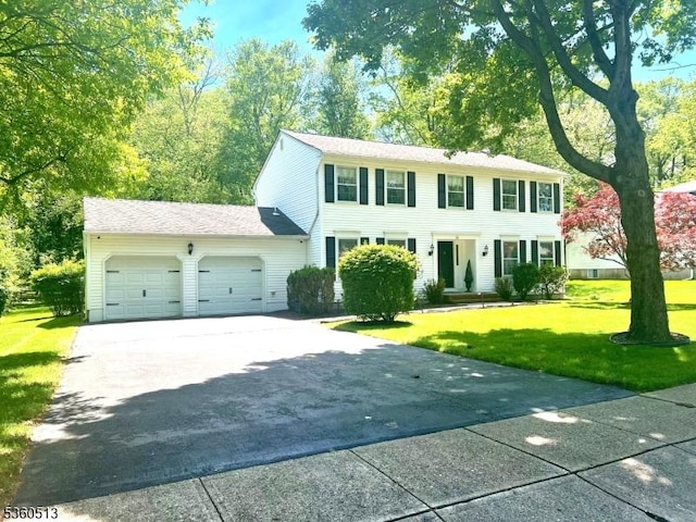 15 Fox Run, Parsippany-Troy Hills Twp, NJ 07834 - colonial home featuring an attached garage, a front lawn, and concrete driveway