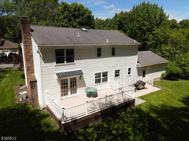 15 Fox Run, Parsippany-Troy Hills Twp, NJ 07834 - rear view of property with french doors, a chimney, cooling unit, a yard, and a wooden deck
