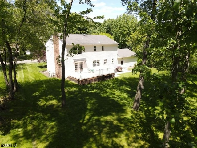 15 Fox Run, Parsippany-Troy Hills Twp, NJ 07834 - back of property featuring a lawn and a wooden deck