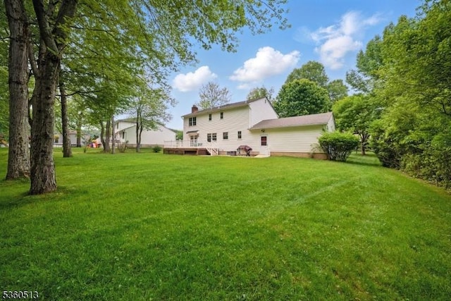 15 Fox Run, Parsippany-Troy Hills Twp, NJ 07834 - view of green lawn featuring a deck