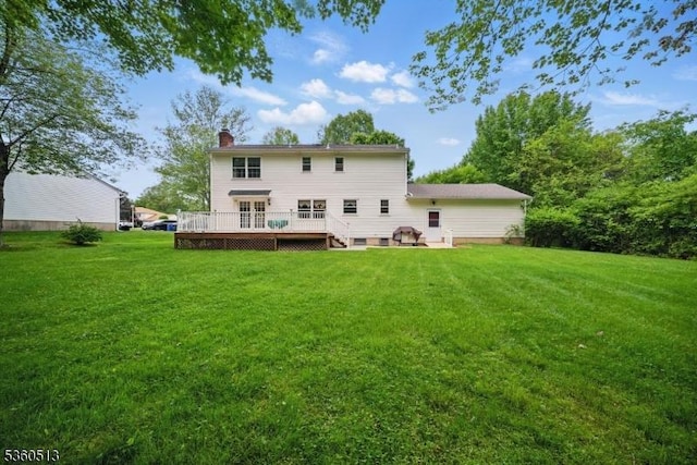 15 Fox Run, Parsippany-Troy Hills Twp, NJ 07834 - back of property with a deck, a chimney, and a yard