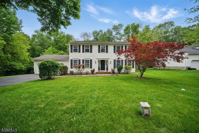 15 Fox Run, Parsippany-Troy Hills Twp, NJ 07834 - colonial inspired home with a front lawn, asphalt driveway, and a garage