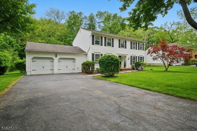 15 Fox Run, Parsippany-Troy Hills Twp, NJ 07834 - colonial-style house with an attached garage, driveway, and a front lawn