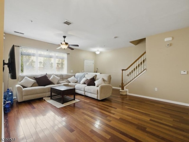 1007 Cunningham Ct Unit 1007, Belleville Twp, NJ 07109 - living room featuring dark wood finished floors, a ceiling fan, stairs, and baseboards