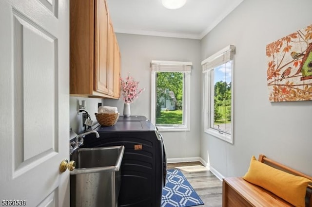1 Colby Farm Rd, Chester Twp, NJ 07930 - laundry area with cabinet space, light wood-style floors, ornamental molding, baseboards, and washer / clothes dryer