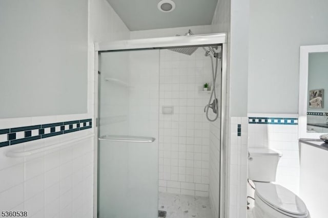 1 Colby Farm Rd, Chester Twp, NJ 07930 - full bath featuring tile walls, a stall shower, toilet, and a wainscoted wall