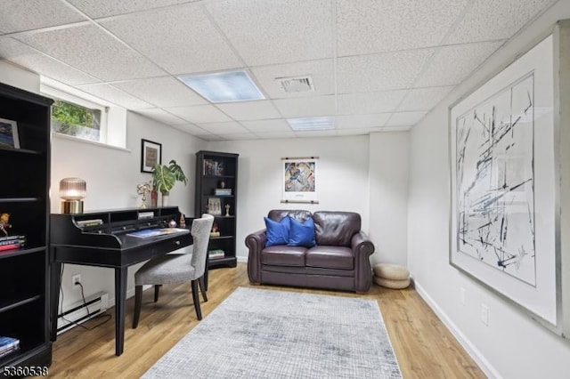 1 Colby Farm Rd, Chester Twp, NJ 07930 - office area featuring a drop ceiling, wood finished floors, baseboard heating, and baseboards