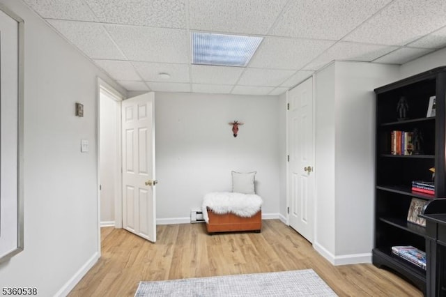 1 Colby Farm Rd, Chester Twp, NJ 07930 - sitting room with light wood-style flooring, a drop ceiling, baseboard heating, and baseboards