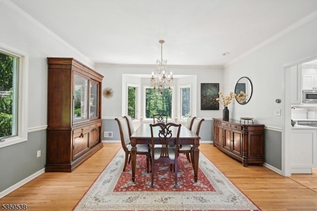 1 Colby Farm Rd, Chester Twp, NJ 07930 - dining room with a chandelier, light wood-style flooring, ornamental molding, and baseboards