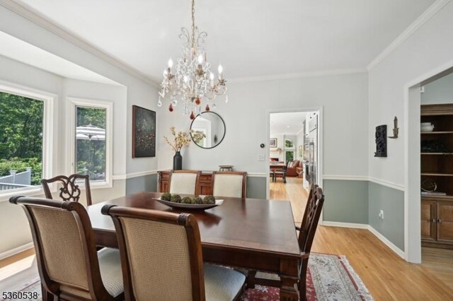 1 Colby Farm Rd, Chester Twp, NJ 07930 - dining area with light wood-style flooring, a chandelier, crown molding, and baseboards