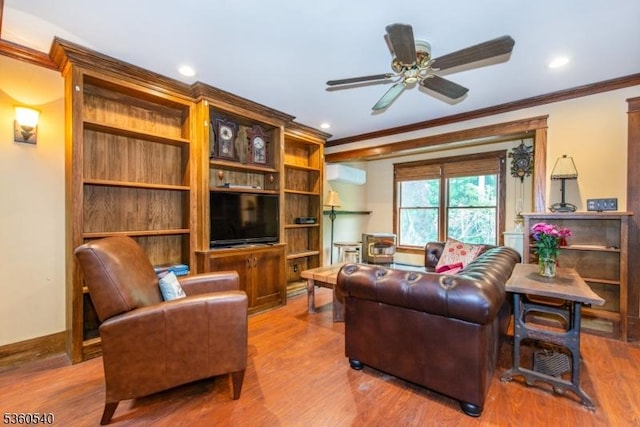 14 Lindberg Trl, Rockaway Twp, NJ 07866 - living area with a wall mounted AC, crown molding, wood finished floors, ceiling fan, and baseboards