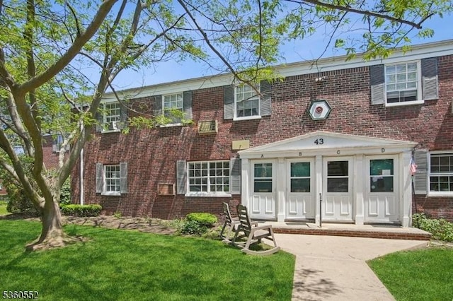43A W Roselle Ave, Roselle Park Boro, NJ 07204 - view of front of property with a front yard and brick siding