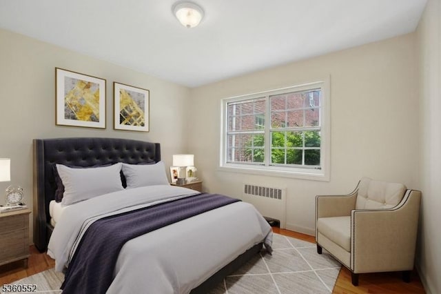 43A W Roselle Ave, Roselle Park Boro, NJ 07204 - bedroom with radiator heating unit, light wood finished floors, and baseboards