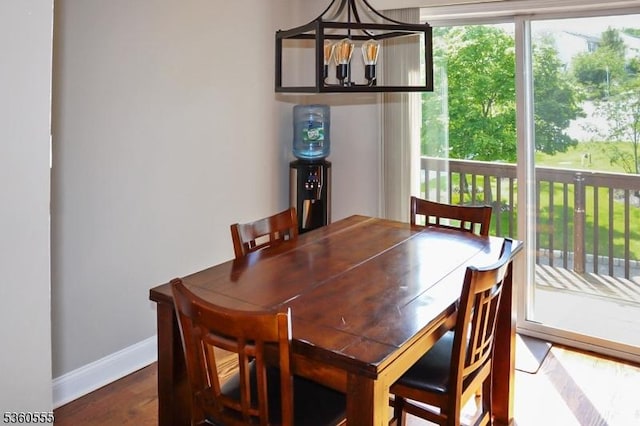 302 Mercer Ct, Independence Twp, NJ 07840 - dining area with baseboards, wood finished floors, and a chandelier