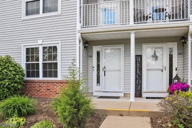 302 Mercer Ct, Independence Twp, NJ 07840 - entrance to property featuring a balcony, brick siding, and a porch