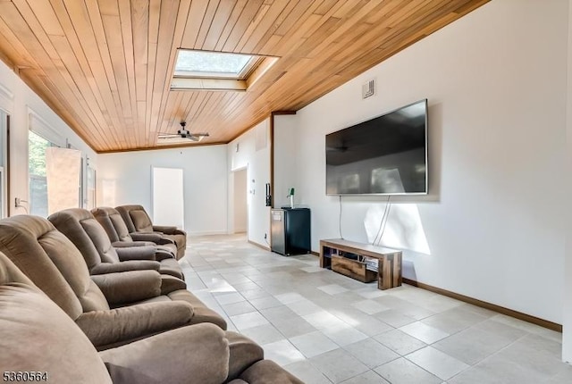 37 King George Rd, Warren Twp, NJ 07059 - living area with wood ceiling, a skylight, light tile patterned flooring, and baseboards