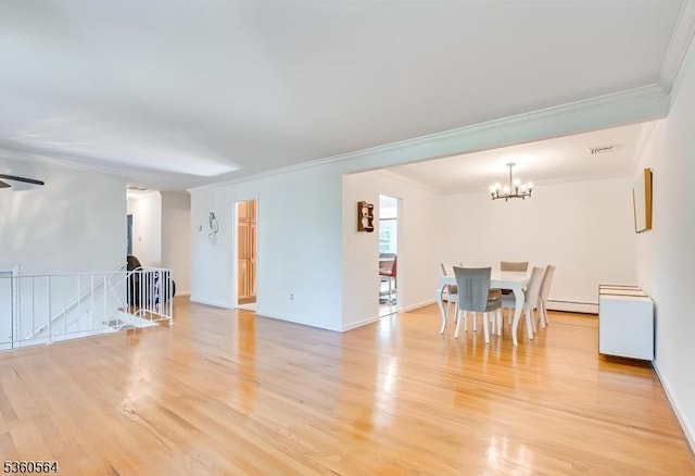 37 King George Rd, Warren Twp, NJ 07059 - living area with ornamental molding, a chandelier, light wood-type flooring, a baseboard radiator, and baseboards