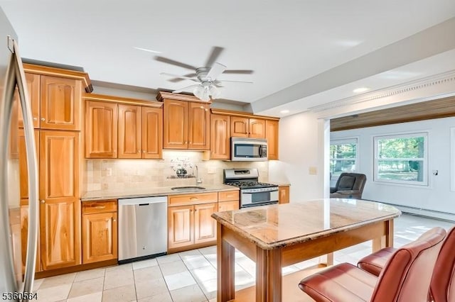 37 King George Rd, Warren Twp, NJ 07059 - kitchen with stainless steel appliances, a sink, a ceiling fan, tasteful backsplash, and light countertops