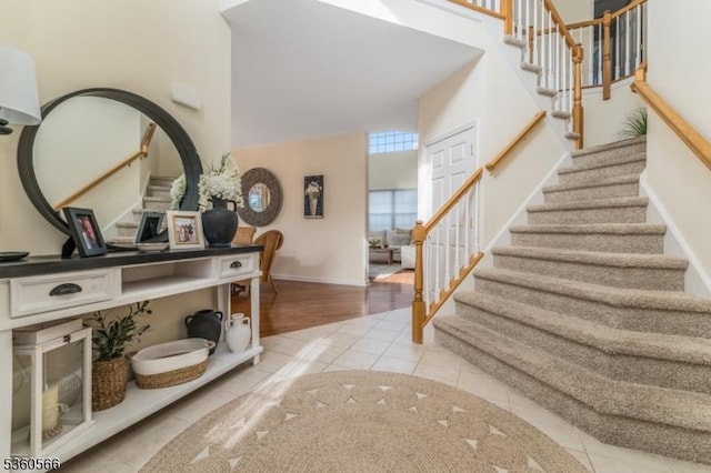 6 Apgar Ct, Raritan Twp, NJ 08822 - entrance foyer with stairway, light tile patterned floors, and baseboards