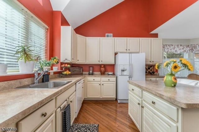 6 Apgar Ct, Raritan Twp, NJ 08822 - kitchen with white appliances, a sink, plenty of natural light, and high vaulted ceiling