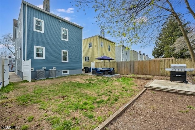 1036 Creger Ave, Union Twp, NJ 07083 - back of house with an outdoor hangout area, a patio area, and central AC