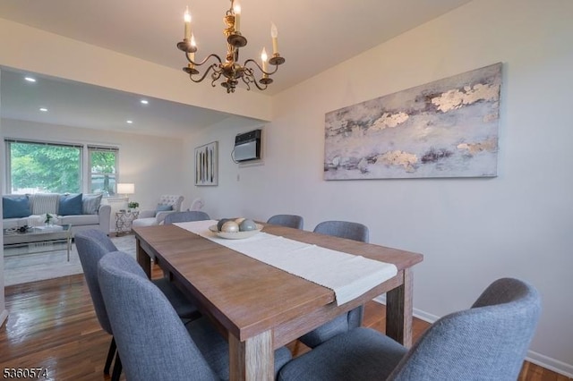 813 Riverbend Dr, Clark Twp, NJ 07066 - dining space with a chandelier, wood finished floors, recessed lighting, a wall unit AC, and baseboards